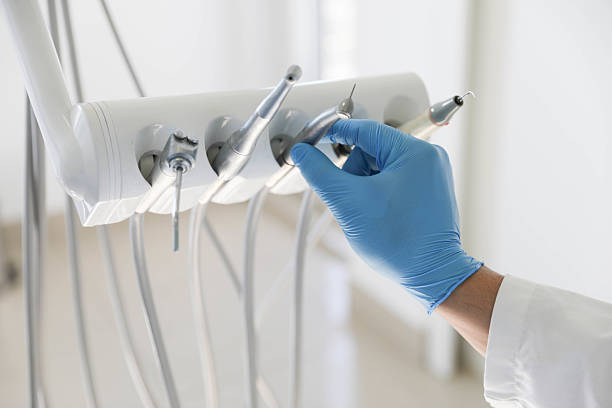 Professional Tooth Extraction technician working in Columbia, CA